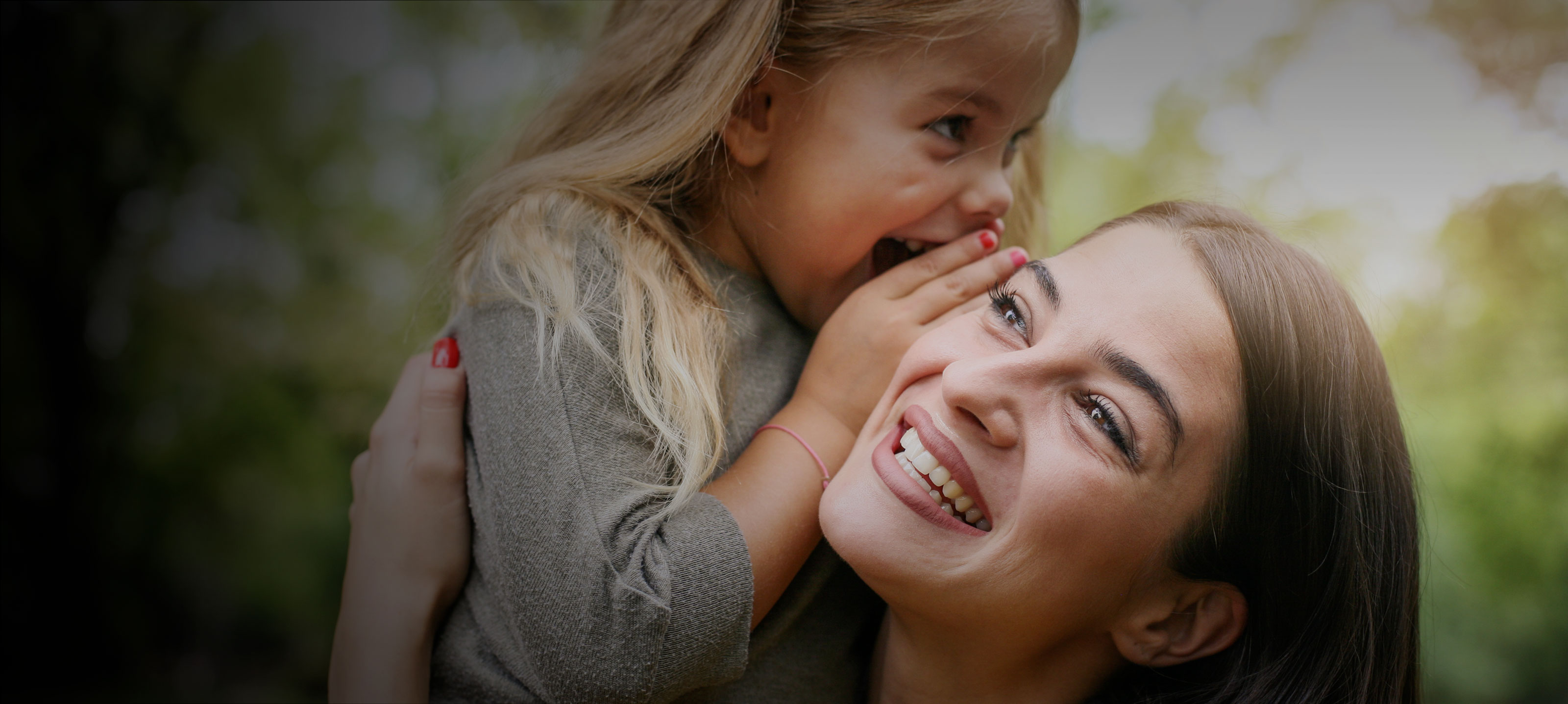 GN Hearing: happy mom with daughter hero overlay
